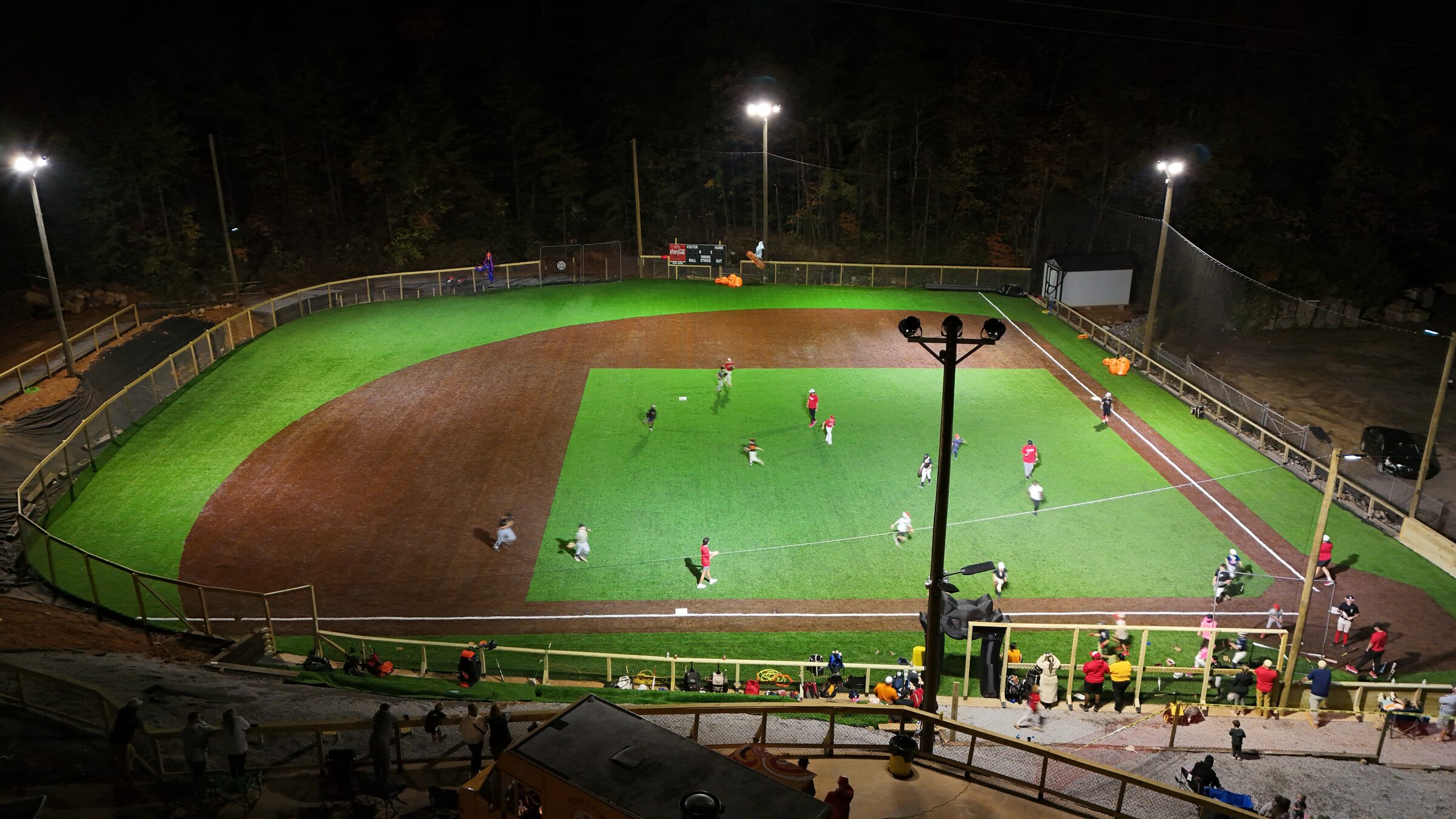 Comp Park turf field under the lights at night